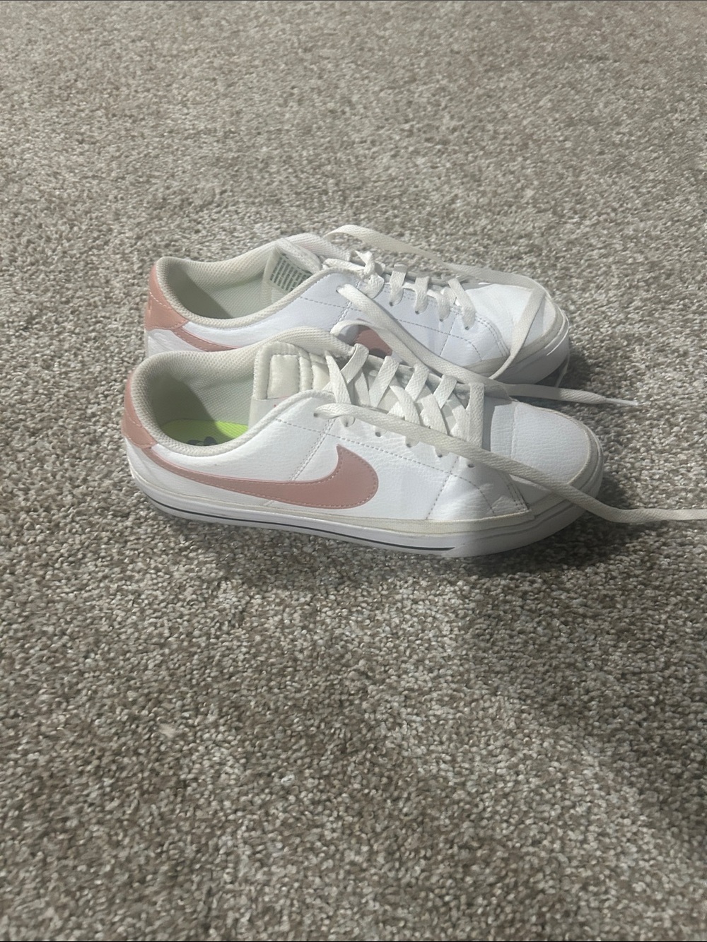 Nike White Low-Top Sneakers with Pink Swoosh